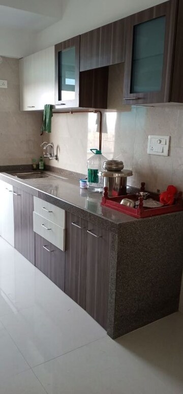 Kitchen in 3 BHK Apartment at Dhoot Sky Residency New Sonali CHSL, Malad West – for Rent