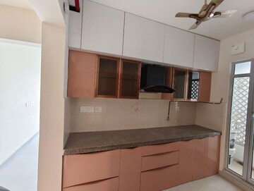Kitchen in 2 BHK Apartment at Piramal Vaikunth, Balkum Pada – for Rent