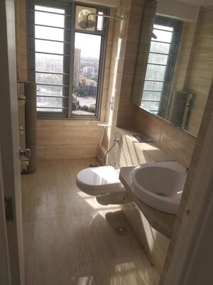 Bathroom in 2 BHK Apartment at Ajmera Arham, Malad West – for Rent