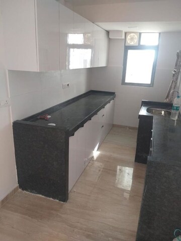 Kitchen in 2 BHK Apartment at Ajmera Arham, Malad West – for Rent