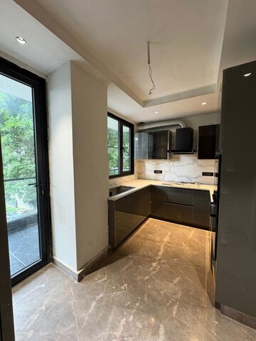 Kitchen in 4 BHK Apartment at Dlf Phase I – for Rent