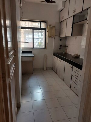 Kitchen in 2 BHK Apartment at Dheeraj Sagar, Malad West – for Rent