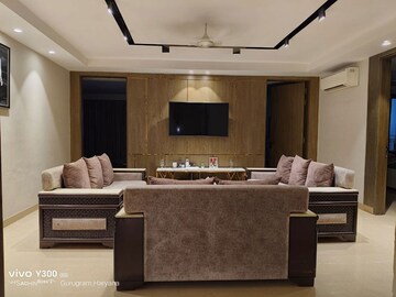 Living Room in 4 BHK Apartment at Sushant Lok I – for Rent