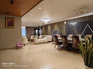 Living Room in 4 BHK Apartment at Sushant Lok I – for Rent