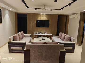 Living Room in 4 BHK Apartment at Sushant Lok I – for Rent