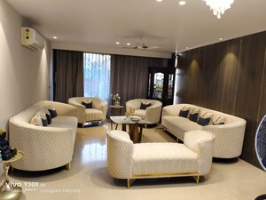 Living Room in 4 BHK Apartment at Sushant Lok I – for Rent