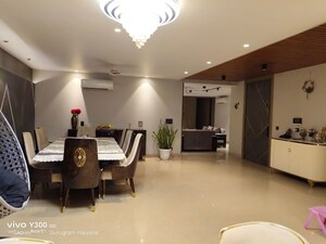 Living Room in 4 BHK Apartment at Sushant Lok I – for Rent