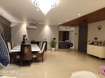 Living Room in 4 BHK Apartment at Sushant Lok I – for Rent