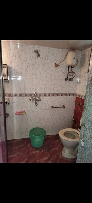 Bathroom in 2 BHK Apartment at Parinee Essence, Kandivali West – for Rent