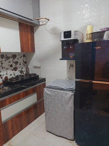 Kitchen in 1 BHK Apartment at Saraf Chaudhary Nagar CHS, Kandivali East – for Rent