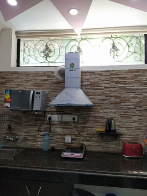 Staircase in Studio Apartment at Kailash Colony – for Rent