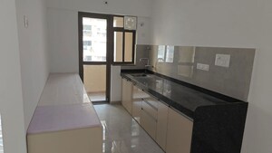 Kitchen in 3 BHK Apartment at Ganga New town, Dhanori – for Rent
