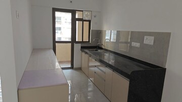 Kitchen in 3 BHK Apartment at Ganga New town, Dhanori – for Rent