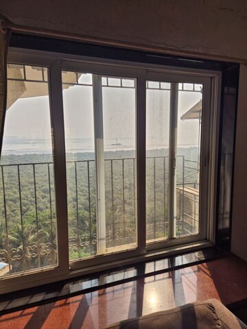 Room in 3 BHK Apartment at NRI Complex Phase I, Seawoods Sector 58 – for Rent