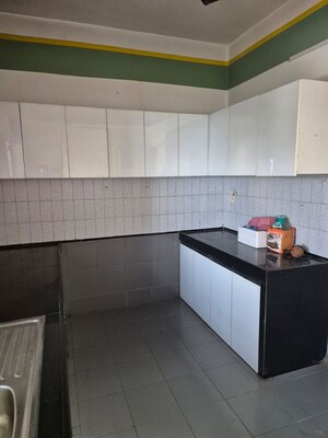 Kitchen in 3 BHK Apartment at NRI Complex Phase I, Seawoods Sector 58 – for Rent