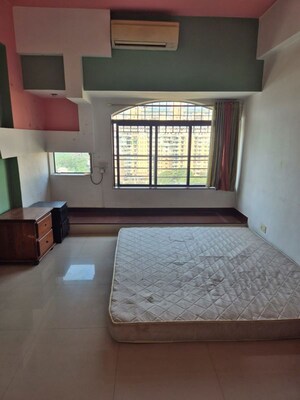 Bedroom in 3 BHK Apartment at NRI Complex Phase I, Seawoods Sector 58 – for Rent