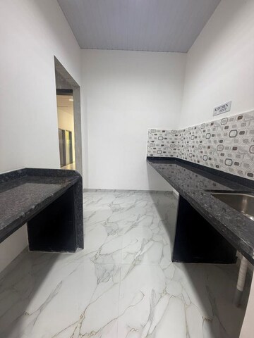 Kitchen in 1 BHK Apartment at Karma Rejoice, Undri – for Sale