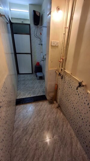 Bathroom in 1 BHK Apartment at Charkop Sector 6 – for Rent