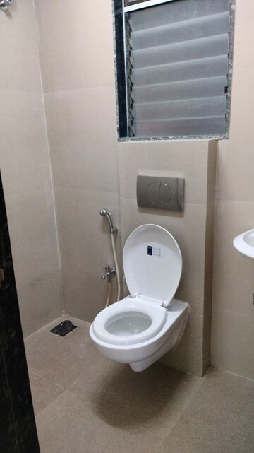Bathroom in 1 BHK Apartment at Je And Vee Om Trimurti, Malad East – for Sale