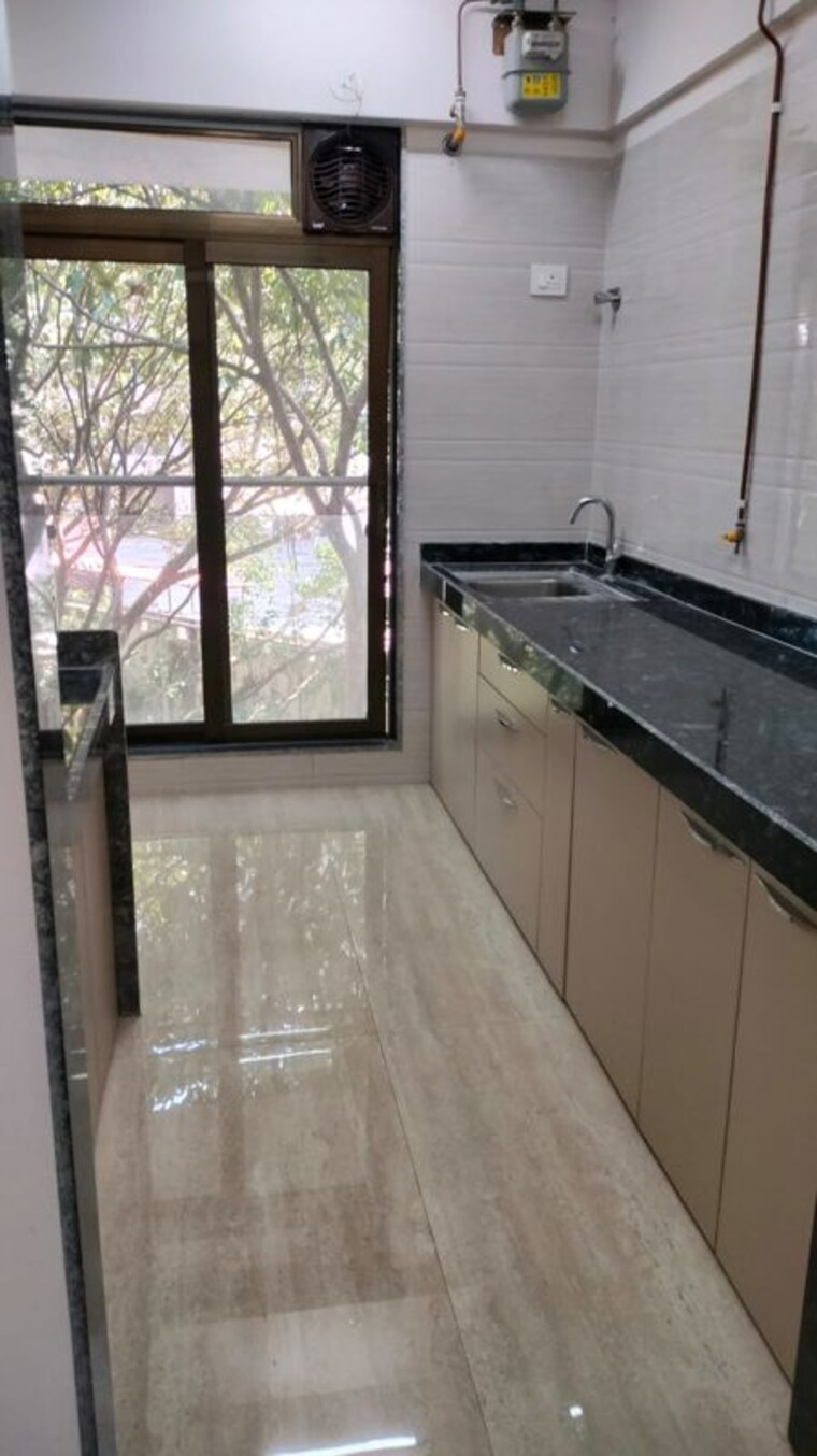 Kitchen, je-and-vee-om-trimurti 1 Bedroom 395 Sq.Ft. Apartment In Malad East Mumbai 9938532