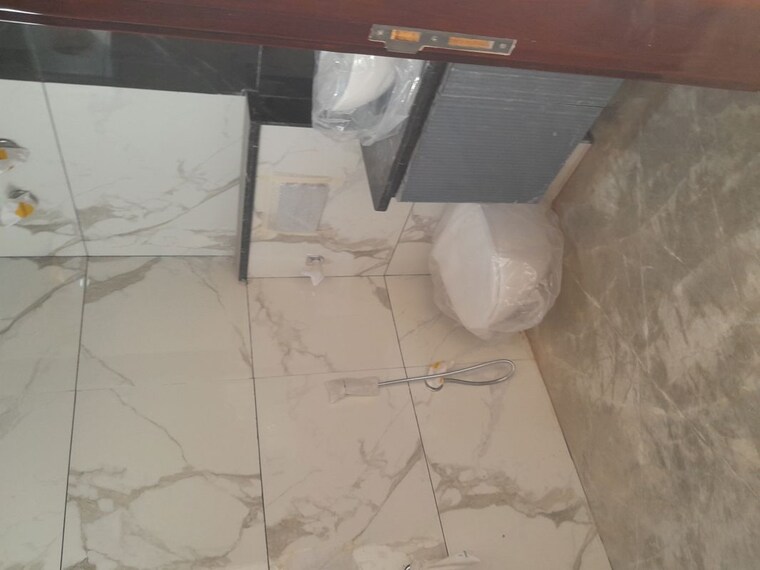 Bathroom, rohini sector 11 3 Bedroom 125 Sq.Yd. Builder Floor In Rohini Sector 11 Delhi 9938547