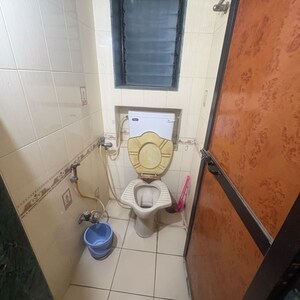 Bathroom in 1 BHK Apartment at Satyalaxmi CHS, Barrister Nath Pai Nagar – for Rent