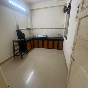 Kitchen in 1 BHK Apartment at Satyalaxmi CHS, Barrister Nath Pai Nagar – for Rent