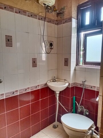 Bathroom in 2 BHK Apartment at Bani Park – for Rent