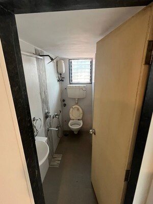 Bathroom in 3 BHK Apartment at Juhu Abhishek Chs Ltd, Andheri West – for Rent