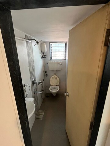 Bathroom in 3 BHK Apartment at Juhu Abhishek Chs Ltd, Andheri West – for Rent