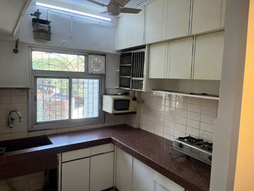 Kitchen in 3 BHK Apartment at Juhu Abhishek Chs Ltd, Andheri West – for Rent