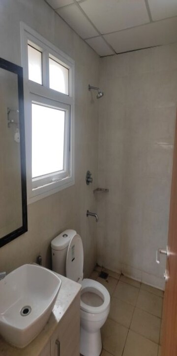 Bathroom in 3 BHK Apartment at Bhartiya Nikoo Homes, Thanisandra Main Road – for Sale