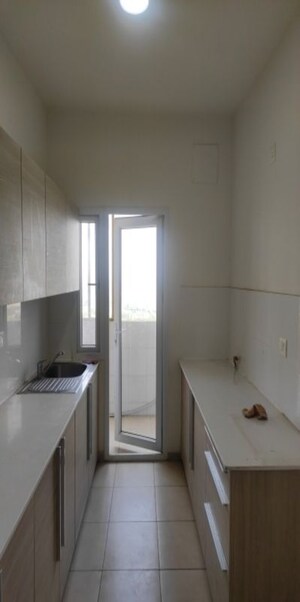 Kitchen in 3 BHK Apartment at Bhartiya Nikoo Homes, Thanisandra Main Road – for Sale