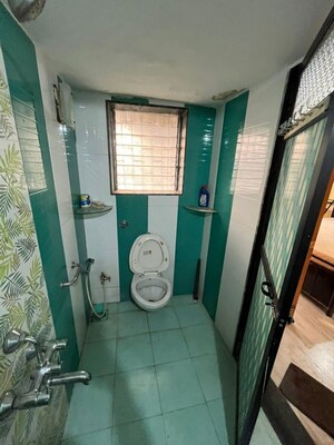 Bathroom in 2 BHK Apartment at Anand Sagar Residency CHS, Khopat – for Rent