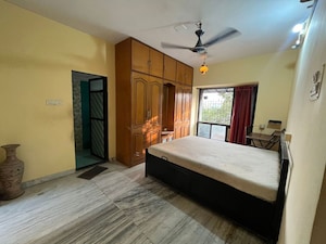 Bedroom in 2 BHK Apartment at Anand Sagar Residency CHS, Khopat – for Rent