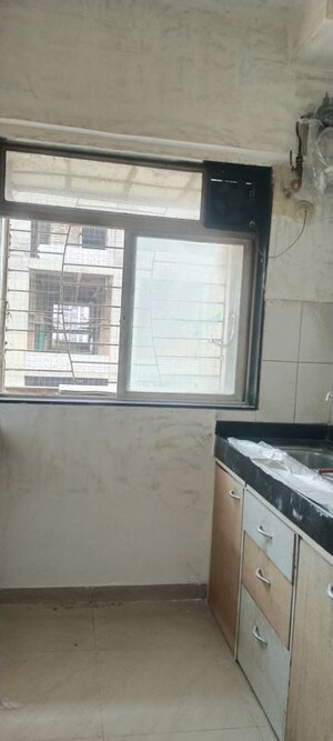 Kitchen in 2 BHK Apartment at Nirmal Lifestyle Residency CHS Ltd, Mulund West – for Rent