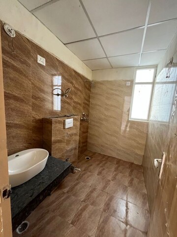 Bathroom in 4 BHK Apartment at Amrapali Heartbeat City, Sector 107 – for Rent