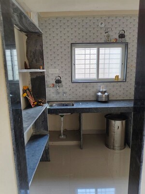 Kitchen in 1 BHK Apartment at Wadgaon Sheri – for Rent