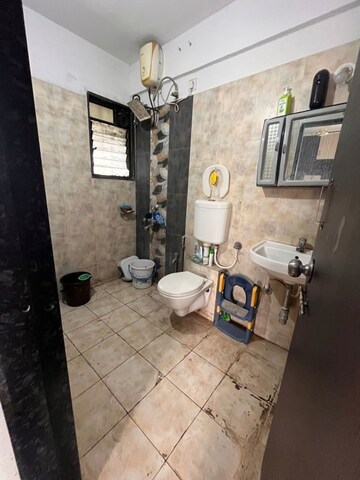 Bathroom in 2 BHK Apartment at Satyam Serenity, Wadgaon Sheri – for Sale