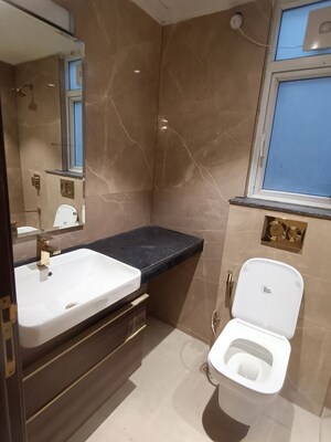 Bathroom in 3 BHK Apartment at Smart World Orchard, Sector 61 – for Rent