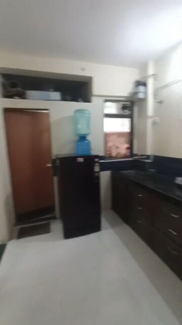 Kitchen in 1 BHK Apartment at Bindra Complex, Andheri East – for Rent