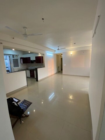 Living Room in 4 BHK Apartment at La Residentia, Amrapali Dream Valley – for Rent