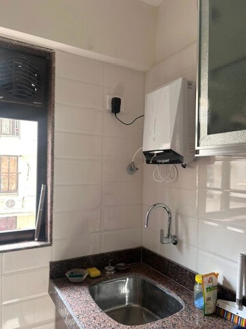 Kitchen in 2 BHK Apartment at Chandiwala Pearl Heaven, Andheri East – for Rent