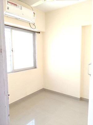Room in 1 BHK Apartment at Dimple 19 North, Kandivali West – for Rent
