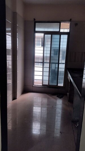 Kitchen in 2 BHK Apartment at Aaron Gomaji Kasturi, Ulwe Sector 5 – for Rent