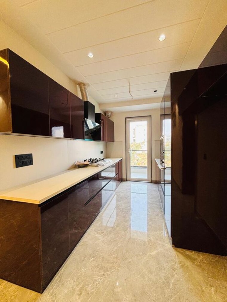 Kitchen, ansal-api-versalia 4 Bedroom 260 Sq.Ft. Builder Floor In Sector 67a Gurgaon 9938940