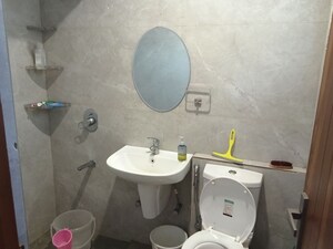 Bathroom in 3 BHK Builder Floor at Dhakoli – for Sale