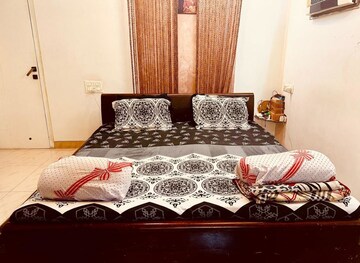 Bedroom in 2 BHK Apartment at Golden Chariot CHS, Lokhandwala Complex – for Rent