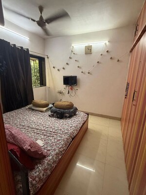 Bedroom in 2 BHK Apartment at Golden Chariot CHS, Lokhandwala Complex – for Rent