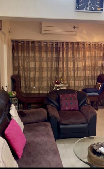 Living Room in 2 BHK Apartment at Golden Chariot CHS, Lokhandwala Complex – for Rent